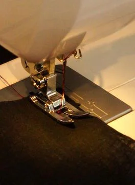 View of sewing machine needle and other parts Stock-Fotos