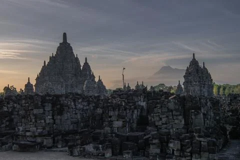 View of Sewu temple or called Candi Sewu at sunset with Merapi volcano on b.. Stock Photos