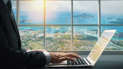 View of Seychelles.Close up hand Businessman using laptop Stock Footage 85088463