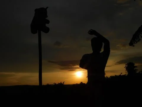 View of a shadow of a man and sunset Stock Photos