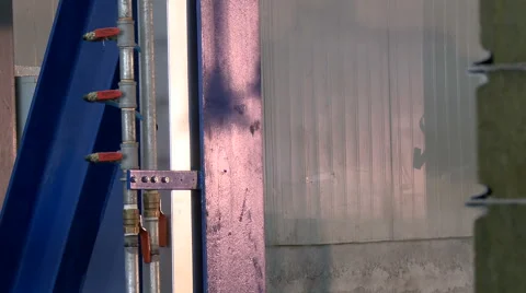 View on shadow of running production machine Stock Footage 56738978