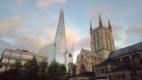 View of The Shard skyscraper, through the old building of Southwark Cathedral Stock Footage 113395624