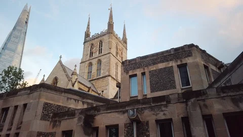 View of The Shard skyscraper, through the old building of Southwark Cathedral Stock Footage 113395933