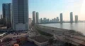 View on Sharjah city through plastic window inside ferris wheel cabin, UAE HD Footage