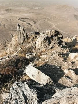 The view from the sharp volcanic rocks on the city of Kabul. Stock Photos