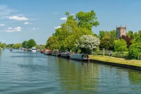 View of the Sharpness - Gloucester canal with St Mary the Virgin Church Stock Photos