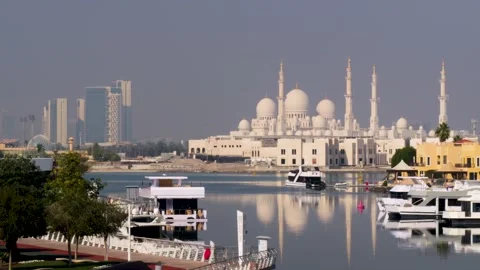 View on Sheikh Zayed Grand Mosque with yachts in Abu Dhabi, United Arab Emirates Stock Footage 327933166