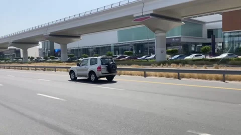A view from sheikh zayed Road Land Cruiser Driving on highway Vidéo 276849947