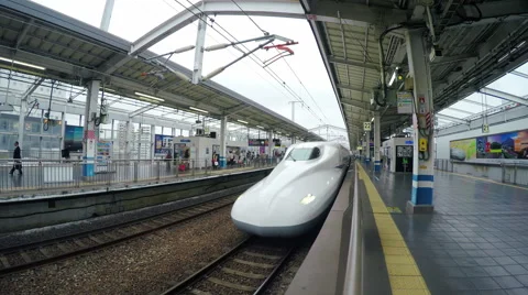 View of a Shinkansen high-speed train arriving at the Shin Osaka Station Stock Footage 44120774