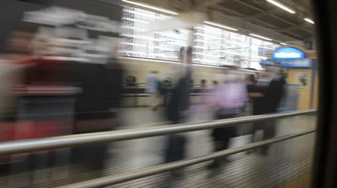 View of a Shinkansen train approaching a station platform. Stock-Footage 25821524