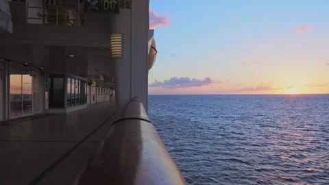 View from ship board of sun setting into sea, picture of sunset reflected in Stock Footage 274709529