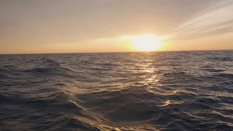 View from ship board while sailing on sea waves and evening sunset in sky Stock Footage 92601770