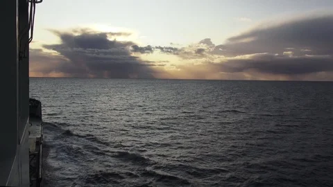 View from ship deck sailing in ocean on magnificent sunset Stock Footage 121116507