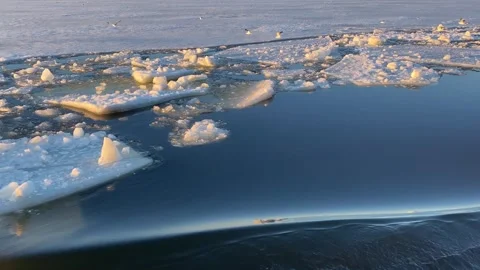 View from the ship of the frozen river at sunset. Movement on water transport Stock Footage 252651470