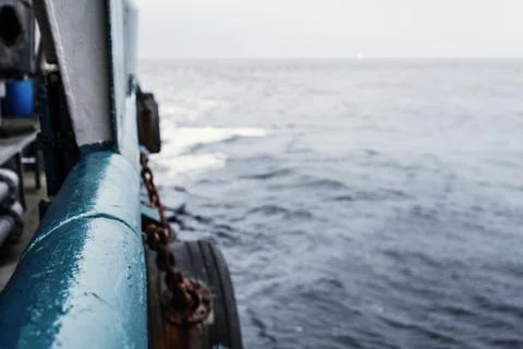 View from ship or vessel deck to open sea - heavy duty work at sea Stock Photos