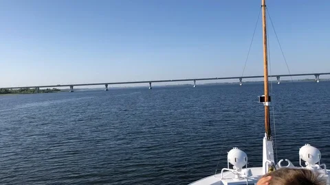 View from the ship to the road bridge. The ship goes on the Volga river Stock Footage 100561594