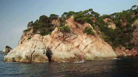 View from the ship to the rocky terrain in Tossa de Mar. Stock Footage 171424424
