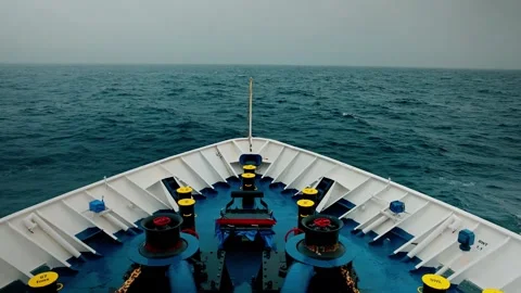 View from Ship's Bow Navigating Rough Open Sea with Maritime Equipment Stock Footage 315094322