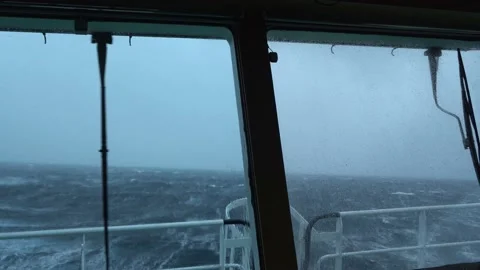 View from ship's bridge. Storm. Ship is rocking. High waves. White foam on the 스톡 동영상 153109858