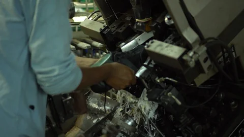 View of a shoe making on a machine in a factory 1 Stock Footage 108845281