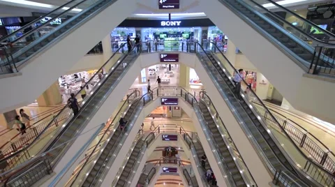 View of shoppers in Suria KLCC Mall in Petronas Stock Footage 64566057