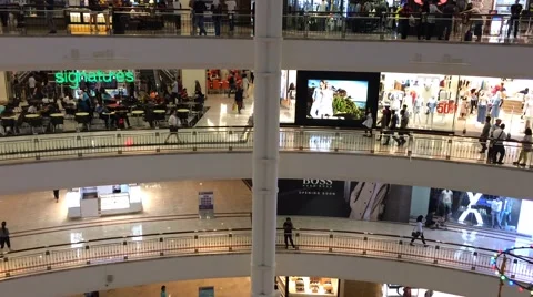 View of shoppers in Suria KLCC Mall in Petronas Stock Footage 64623304