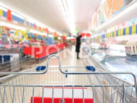 View of a shopping cart at supermarket Stock Photos