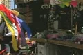 View of shopping stall and people walking past it Footage