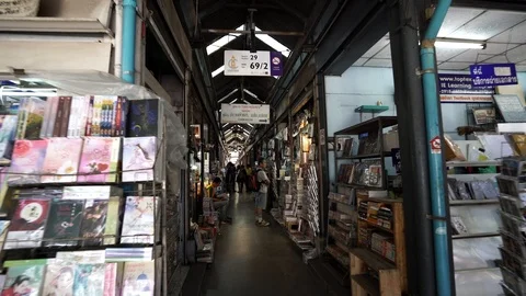 View of shops in Chatuchak Market with crowds visiting. Stock Footage 101538932