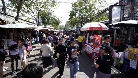 View of shops in Chatuchak Market with crowds visiting. Stock Footage 101557550