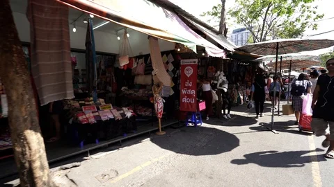 View of shops in Chatuchak Market with crowds visiting. Stock Footage 101557651