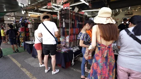 View of shops in Chatuchak Market with crowds visiting. Stock Footage 101557698