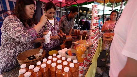 View of shops in Chatuchak Market with crowds visiting. Stock Footage 101557822