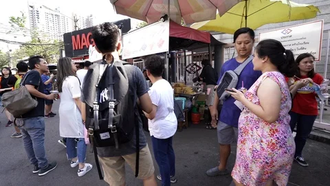 View of shops in Chatuchak Market with crowds visiting. Stock Footage 101557826