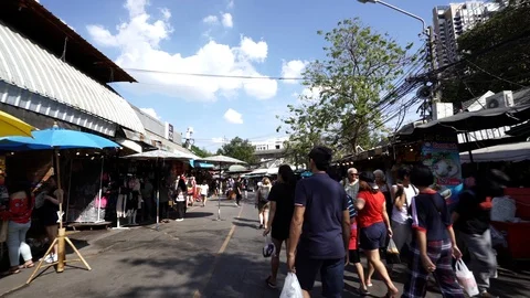 View of shops in Chatuchak Market with crowds visiting. Stock Footage 101557958