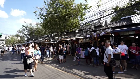 View of shops in Chatuchak Market with crowds visiting. Stock Footage 101558005