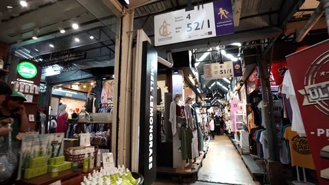 View of shops in Chatuchak Market with crowds visiting. Stock Footage 101558117