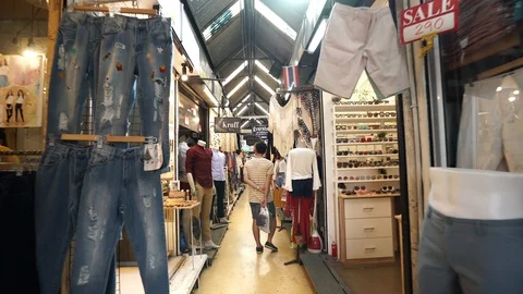 View of shops in Chatuchak Market with crowds visiting. Stock Footage 101558136