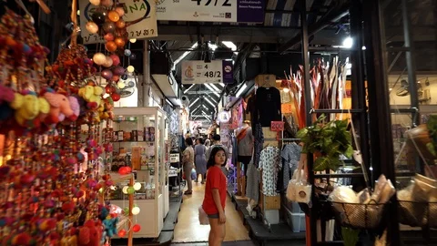 View of shops in Chatuchak Market with crowds visiting. Stock Footage 101558239