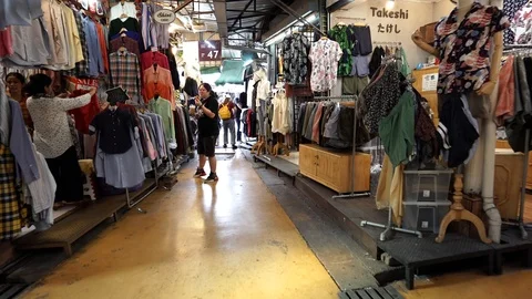View of shops in Chatuchak Market with crowds visiting. Stock Footage 101558409