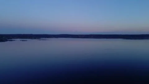 View of shoreline front distance at dusk blue hour Stock Footage 294707450
