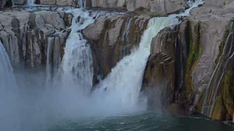View of Shoshone Falls cascading over rocky cliffs, United States. Video stock 344411075