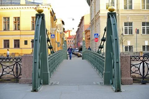 The view in the shot on Pochtamtsky bridge across the Moika river in a Sunny  Stock Photos