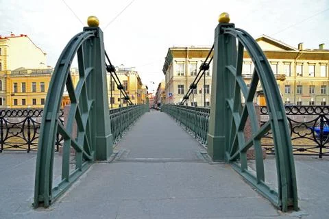 The view in the shot on Pochtamtsky bridge across the Moika river in a Sunny  Stock Photos