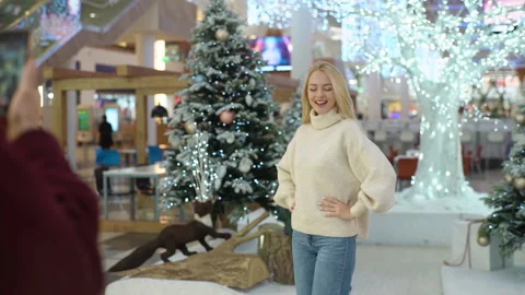 View from shoulder of unrecognizable man taking photo with smartphone camera to Stock Footage 220865014