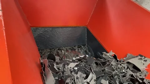 View of shredder blades spinning to cut material into fine pieces Stock Footage 346812922