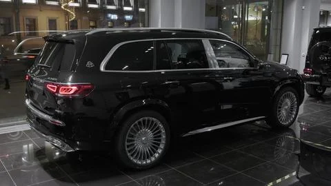 View of side and of prestigious SUV Mercedes Maybach GLS 600 at dealer showroom Stock Photos