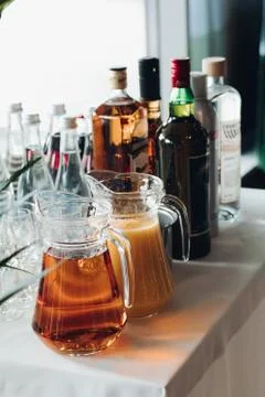 View from side of beverages served on table during party Stock-Fotos