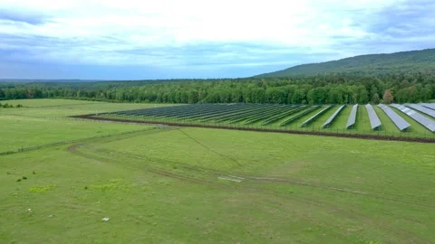 View from the side of the blue panels installed at the solar power plant. A Stock Footage 156072479