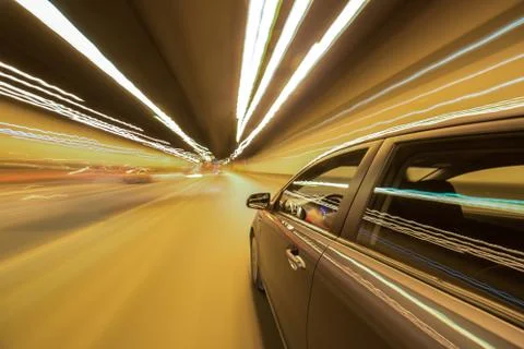 View from Side of Car moving in a night city Stock Photos